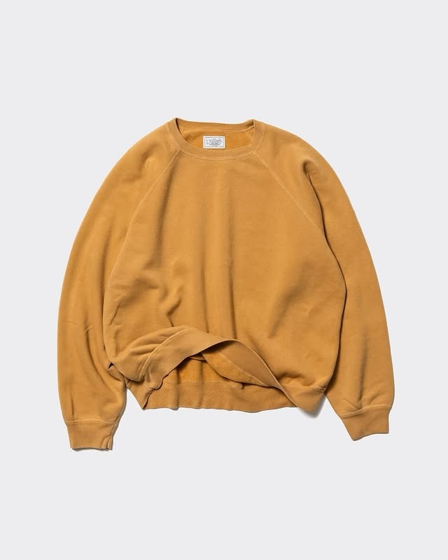 Unlikely 26AW Raglan Sleeve Crew